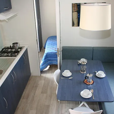 Happy Camp Mobile Homes In Village Baia Paradiso Camping